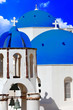 blue churches domes - symbol of unique Santorini