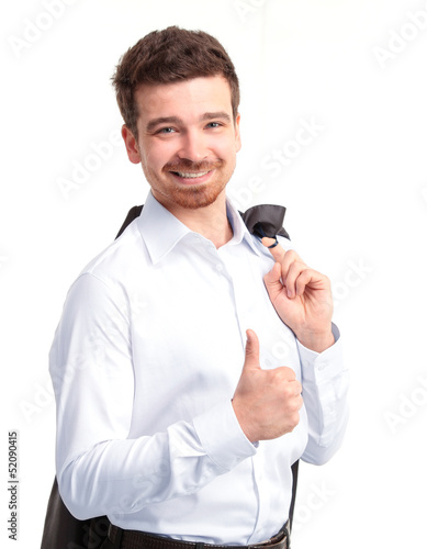 Photo: Happy smiling young business man with thumbs up gesture Happy smiling young business man with thumbs up gesture