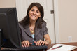 Photo: Businesswoman working in home office Businesswoman working in home office