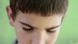 Video: Portrait of serious boy, sad young man staring at camera Portrait of serious boy, sad young man staring at camera