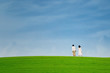 Blue sky landscape and couple