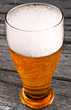 beer on wood background