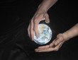 crystal globe and hands