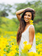 woman in field of flowers