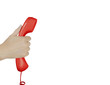 Foto: hand holding a telephone hand holding a telephone
