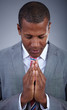 Businessman praying