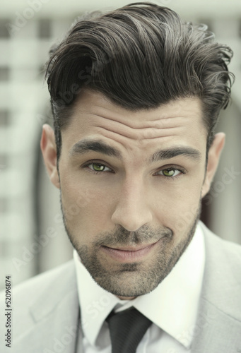 Photo: Young business man close Young business man close