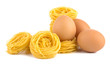 Eggs and pasta nest isolated on white background