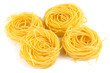 Eggs and pasta nest isolated on white background