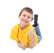 boy in yellow t-shirt lying