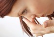 Foto: young woman with contact lense young woman with contact lense