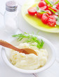 Mushed potato in the white bowl