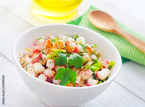 Photo: Fresh salad with greens and seafood Fresh salad with greens and seafood