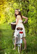 Young woman with bike