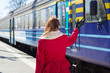 Photo: woman waving hand on the platform woman waving hand on the platform