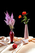 Still-life with bunches of flowers on a golden fabric