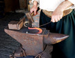 blacksmith making horseshoes