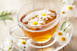 cup of herbal tea with chamomile flowers