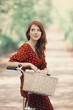 Girl on a bike in the countryside