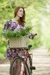 Girl on a bike in the countryside