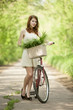 Girl on a bike in the countryside