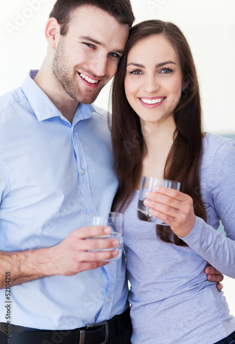 Photo: Couple with glasses of water Couple with glasses of water