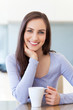 Photo: Woman with cup of coffee Woman with cup of coffee