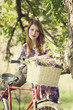 Girl on a bike in the countryside