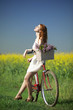Girl on a bike in the countryside