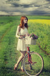 Girl on a bike in the countryside