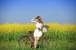 Girl on a bike in the countryside