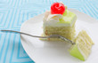 vanilla cake slice and fresh cherry