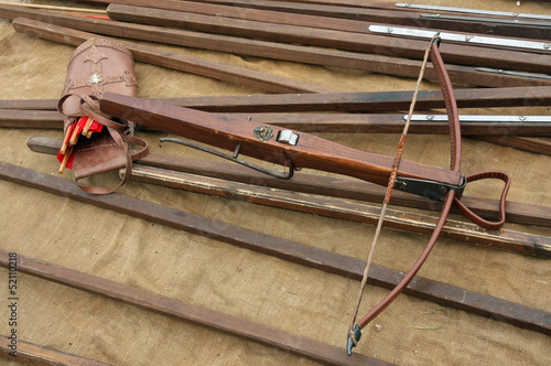 Photo: wooden crossbow with arrows and other ancient wooden crossbow with arrows and other ancient