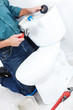 Photo: The worker with a plunger The worker with a plunger