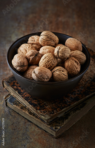 Photo: Still life with walnuts in a ceramic bowl Still life with walnuts in a ceramic bowl
