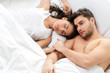 Young adult couple in bedroom