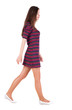 back view of walking  woman