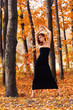 hot young woman in autumn park