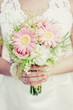 Photo: Bride with wedding bouquet Bride with wedding bouquet