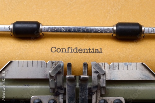 Photo: Confidential text on typewriter Confidential text on typewriter