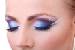 Beautiful female eyes with bright blue make-up