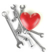 Heart and tools. Concept: Renovation of heart. Isolated on