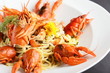 boiled crab in a white dish and  black background