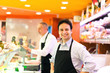 Butchers in a supermarket at work Butchers in a supermarket at work