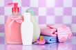 Baby cosmetics and towels  in bathroom