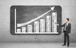 man pointing on a graph