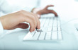 Photo: hands pushing keys hands pushing keys