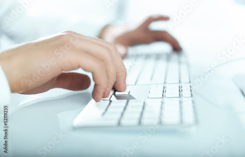 Photo: hands pushing keys hands pushing keys