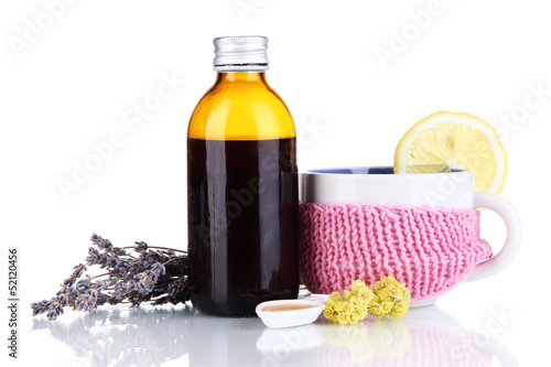 Photo: Cough syrup isolated on white Cough syrup isolated on white
