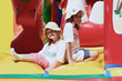 Cute little sisters in a jumping castle